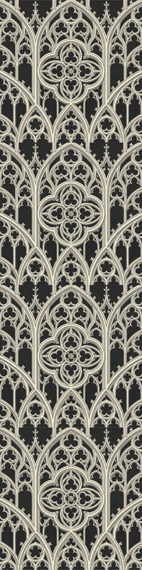 Gothic tracery wallpaper with ornate cream geometric patterns on a black background