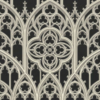 Gothic tracery wallpaper with ornate cream geometric patterns on a black background