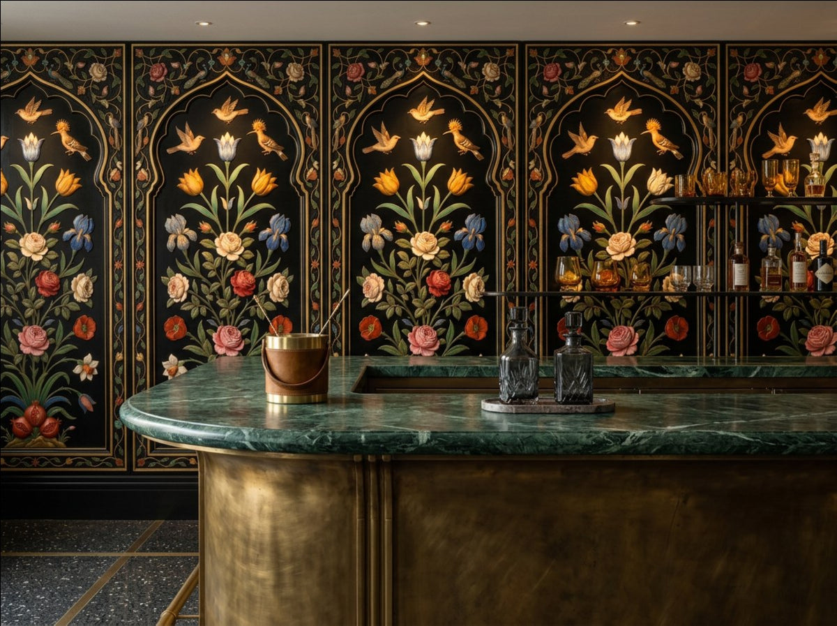 The Inlaid Garden Mughal pietra dura arch wallpaper behind a green marble and brass home bar