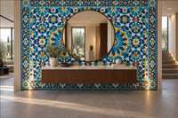 Samarkand Blue tile-look mural wallpaper in an entrance hall with a round brass mirror and floating walnut console